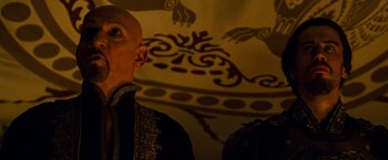 Movie still from “Prince of Persia: The Sands of Time” (2010), directed by Mike Newell – A man with a bald head looking up at the ceiling; Close Up shot, Low angle