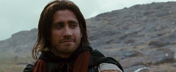 Movie still from “Prince of Persia: The Sands of Time” (2010), directed by Mike Newell – A person wearing a jacket; Close Up shot, Over the shoulder angle