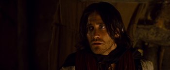 Movie still from “Prince of Persia: The Sands of Time” (2010), directed by Mike Newell – A person with long dark hair; Close Up shot, Over the shoulder angle