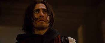 Movie still from “Prince of Persia: The Sands of Time” (2010), directed by Mike Newell – A person with long brown hair; Close Up shot, Low angle