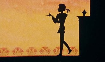 Movie still from “Princes and Princesses” (2000), directed by Michel Ocelot – A silhouette of a woman holding a bird; Wide shot, Low angle