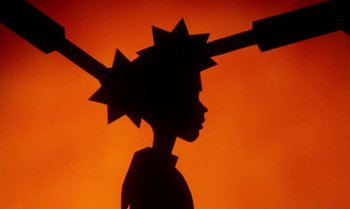 Movie still from “Princes and Princesses” (2000), directed by Michel Ocelot – A silhouette of a person with a sun behind it; Extreme Close Up shot, Low angle