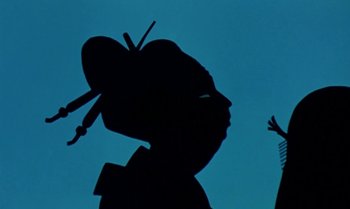 Movie still from “Princes and Princesses” (2000), directed by Michel Ocelot – The silhouette of a person is shown in the dark sky; Extreme Close Up shot, Low angle