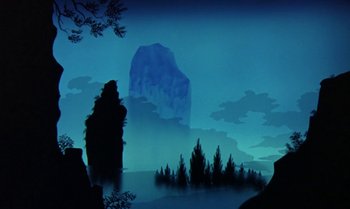 Movie still from “Princes and Princesses” (2000), directed by Michel Ocelot – A painting of a mountain in the middle of the night; Extreme Wide shot, Low angle