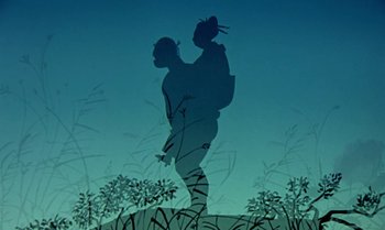 Movie still from “Princes and Princesses” (2000), directed by Michel Ocelot – A silhouette of a man holding a young girl in his arms; Wide shot, Low angle