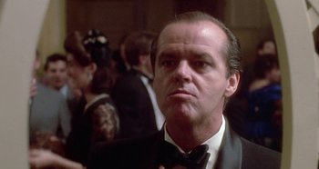 Movie still from “Prizzi's Honor” (1985), directed by John Huston – Jack nicholson wearing a tuxedo; Close Up shot, Low angle