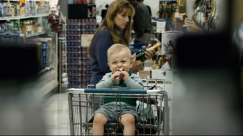 Movie still from “Project X” (2012), directed by Nima Nourizadeh – A baby sitting in a shopping cart in a store; Close Up shot, Over the shoulder angle