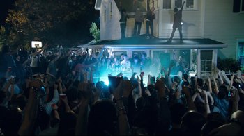 Movie still from “Project X” (2012), directed by Nima Nourizadeh – A group of people standing on top of a building; Extreme Wide shot, High angle