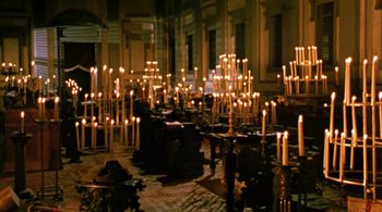 Movie still from “Prospero's Books” (1991), directed by Peter Greenaway – A room filled with lots of lit up candles; Extreme Wide shot, High angle
