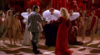 Movie still from “Prospero's Books” (1991), directed by Peter Greenaway – A group of people dressed up in costumes; Wide shot, Overhead angle