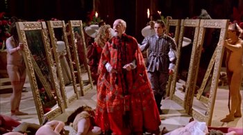 Movie still from “Prospero's Books” (1991), directed by Peter Greenaway – A group of people dressed in medieval costumes; Wide shot, High angle