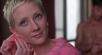 Movie still from “Psycho” (1998), directed by Gus Van Sant – A person with short hair; Close Up shot, Over the shoulder angle