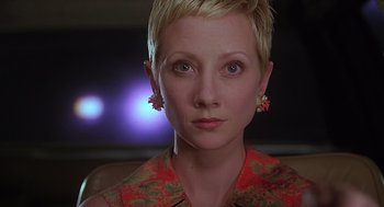 Movie still from “Psycho” (1998), directed by Gus Van Sant – A person with short blonde hair; Close Up shot, Low angle