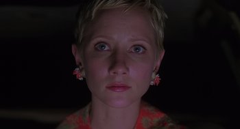 Movie still from “Psycho” (1998), directed by Gus Van Sant – A person with short blonde hair; Close Up shot, Low angle