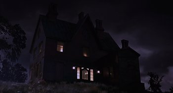 Movie still from “Psycho” (1998), directed by Gus Van Sant – A house with a dark sky in the background at night; Extreme Wide shot, Low angle