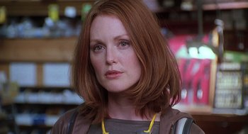 Movie still from “Psycho” (1998), directed by Gus Van Sant – A person wearing a necklace; Close Up shot, Over the shoulder angle