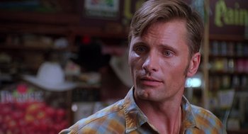 Movie still from “Psycho” (1998), directed by Gus Van Sant – A person wearing a plaid shirt; Close Up shot, Low angle