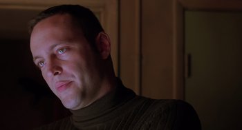 Movie still from “Psycho” (1998), directed by Gus Van Sant – A person wearing a sweater; Close Up shot, Low angle