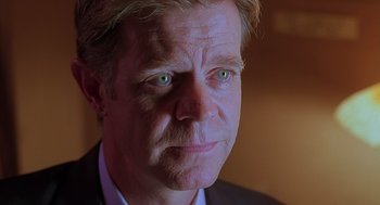 Movie still from “Psycho” (1998), directed by Gus Van Sant – A person with green eyes; Close Up shot, Over the shoulder angle