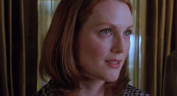 Movie still from “Psycho” (1998), directed by Gus Van Sant – A woman with red hair; Close Up shot, Over the shoulder angle