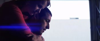 Movie still from “Punch-Drunk Love” (2002), directed by Paul Thomas Anderson – A man and a woman looking at one another; Close Up shot, Low angle