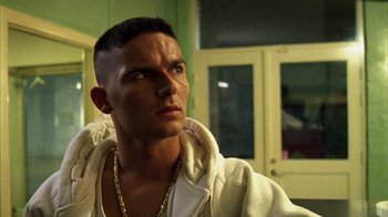 Movie still from “Pusher III” (2005), directed by Nicolas Winding Refn – A person wearing a jacket; Close Up shot, Low angle