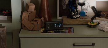 Movie still from “13 Reasons Why” (2017), created by Brian Yorkey – An alarm clock sitting on the desk; Extreme Close Up shot, High angle