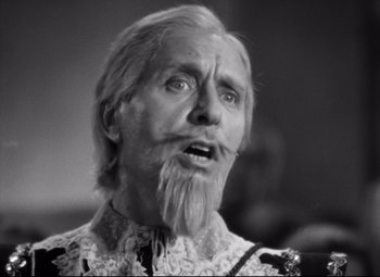 Movie still from “Queen Christina” (1933), directed by Rouben Mamoulian – An old man with a long white beard; Close Up shot, Low angle