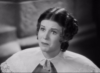 Movie still from “Queen Christina” (1933), directed by Rouben Mamoulian – An old photo of an older woman looking at the camera; Close Up shot, High angle