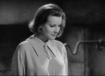 Movie still from “Queen Christina” (1933), directed by Rouben Mamoulian – An old black and white photo of a woman; Close Up shot, High angle