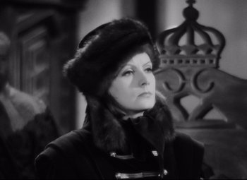 Movie still from “Queen Christina” (1933), directed by Rouben Mamoulian – An old photo of a woman in a fur hat; Close Up shot, High angle
