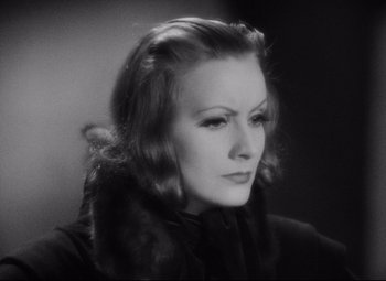 Movie still from “Queen Christina” (1933), directed by Rouben Mamoulian – An old black and white photo of a woman; Close Up shot, High angle