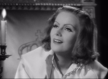 Movie still from “Queen Christina” (1933), directed by Rouben Mamoulian – An old black and white photo of a woman; Close Up shot, High angle