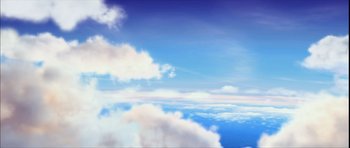 Movie still from “Quest for Fire” (1981), directed by Jean-Jacques Annaud – A view of the sky from an airplane window; Extreme Wide shot, Low angle