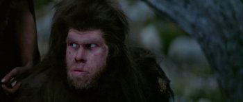 Movie still from “Quest for Fire” (1981), directed by Jean-Jacques Annaud – The face of an ape; Close Up shot, Low angle