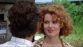 Movie still from “Quick Change” (1990), directed by Howard Franklin – A man and a woman looking into each others eyes; Close Up shot, Over the shoulder angle