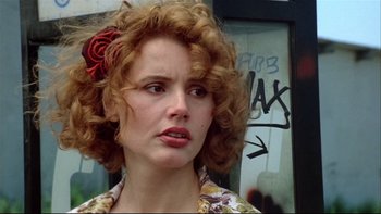 Movie still from “Quick Change” (1990), directed by Howard Franklin – A person with curly red hair; Close Up shot, Over the shoulder angle