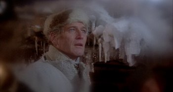 Movie still from “Quintet” (1979), directed by Robert Altman – A person wearing a hat; Close Up shot, Low angle