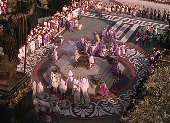 Movie still from “Quo Vadis” (1951), directed by Anthony Mann – A group of people dressed in ancient roman clothing; Extreme Wide shot, High angle