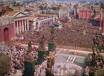 Movie still from “Quo Vadis” (1951), directed by Anthony Mann – An aerial view of a large crowd of people in a city; Extreme Wide shot, High angle