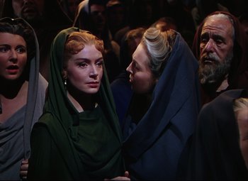 Movie still from “Quo Vadis” (1951), directed by Anthony Mann – A woman in a green robe and a man in a blue robe; Medium shot, Over the shoulder angle