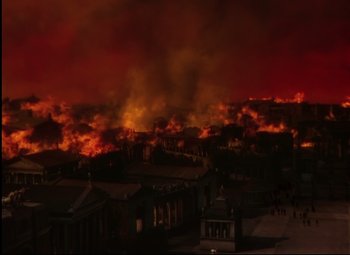 Movie still from “Quo Vadis” (1951), directed by Anthony Mann – A large fire is burning in a city; Extreme Wide shot, High angle