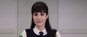 Movie still from “R.I.P.D.” (2013), directed by Robert Schwentke – A person wearing a uniform; Close Up shot, Over the shoulder angle