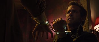 Movie still from “R.I.P.D.” (2013), directed by Robert Schwentke – A man holding a pair of scissors in front of his face; Close Up shot, Low angle