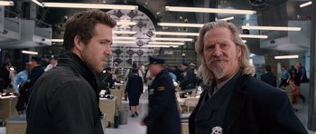 Movie still from “R.I.P.D.” (2013), directed by Robert Schwentke – Two men standing next to each other in a room; Close Up shot, Over the shoulder angle