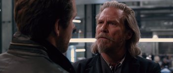 Movie still from “R.I.P.D.” (2013), directed by Robert Schwentke – A man with long white hair talking to another man; Close Up shot, Over the shoulder angle