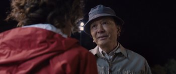 Movie still from “R.I.P.D.” (2013), directed by Robert Schwentke – An older man wearing a hat and a jacket talking to a young person; Close Up shot, Over the shoulder angle