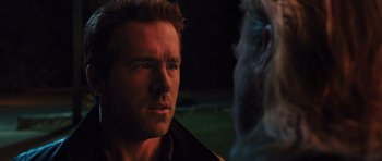 Movie still from “R.I.P.D.” (2013), directed by Robert Schwentke – A person talking to another person; Close Up shot, Over the shoulder angle