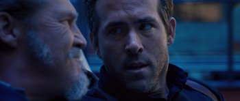 Movie still from “R.I.P.D.” (2013), directed by Robert Schwentke – A person with a beard; Close Up shot, Over the shoulder angle