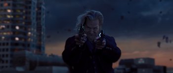 Movie still from “R.I.P.D.” (2013), directed by Robert Schwentke – A man holding two pistols in his hands; Medium shot, Low angle
